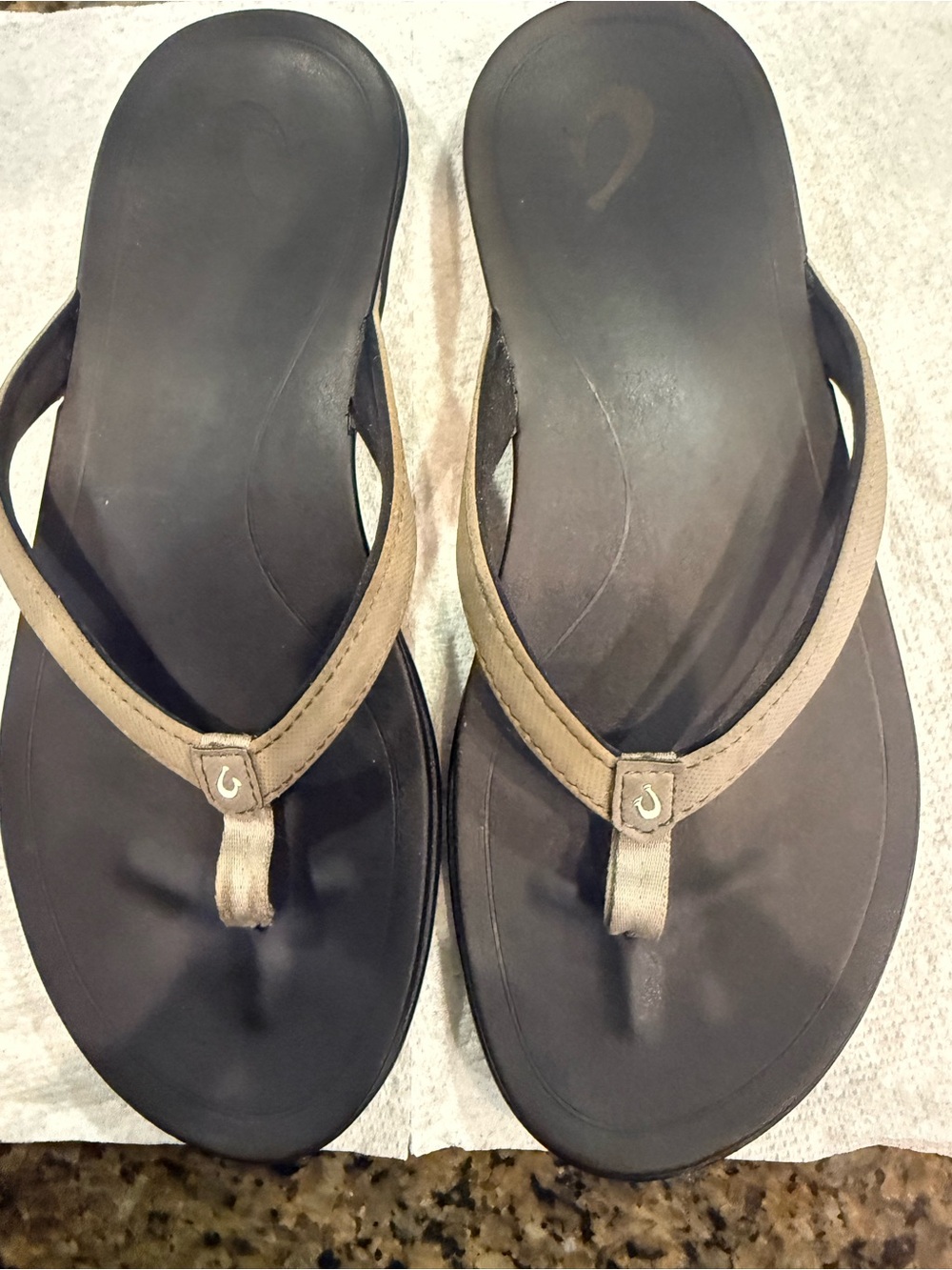 OluKai Black Footbed Sandals with Tan Straps